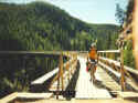 Larry crossing #6 Trestle at Myra Canyon