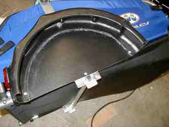 Half of an Oil Drain Pan Fitted Half of an Oil Drain Pan Fitted